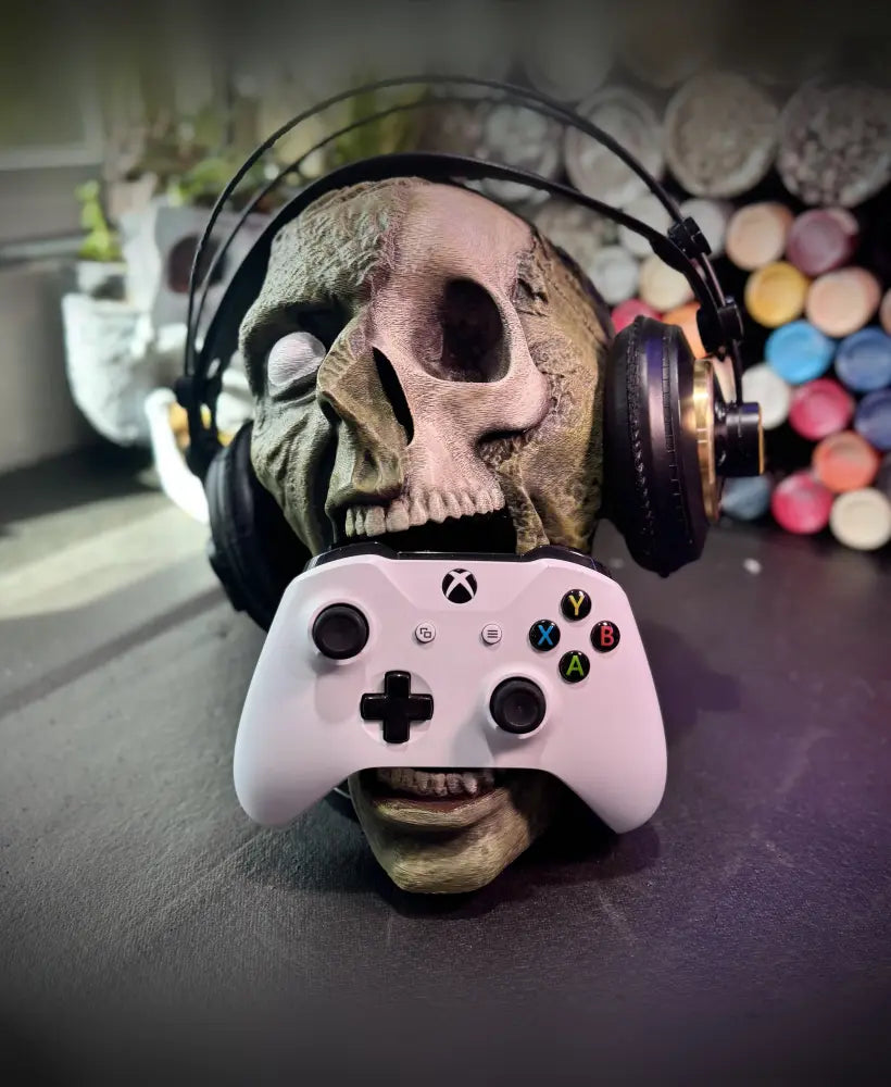 Zombie skull headphones and controller holder..stl