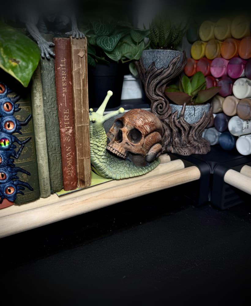 Skull snail bookends