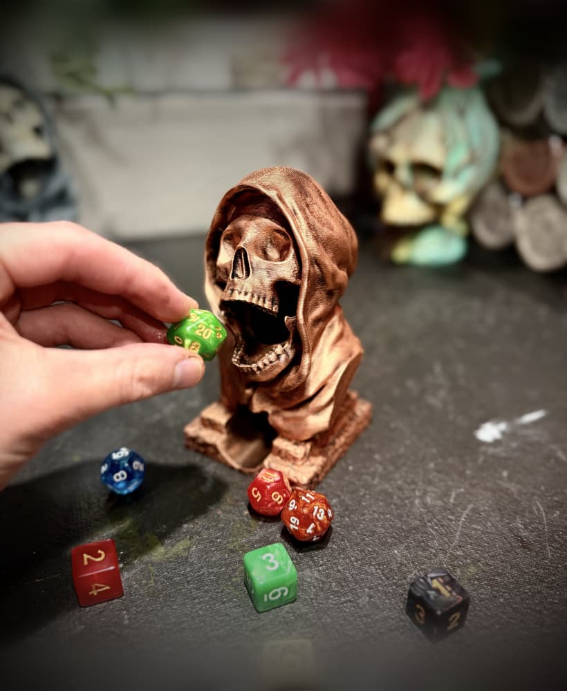 Hooded skull dice tower